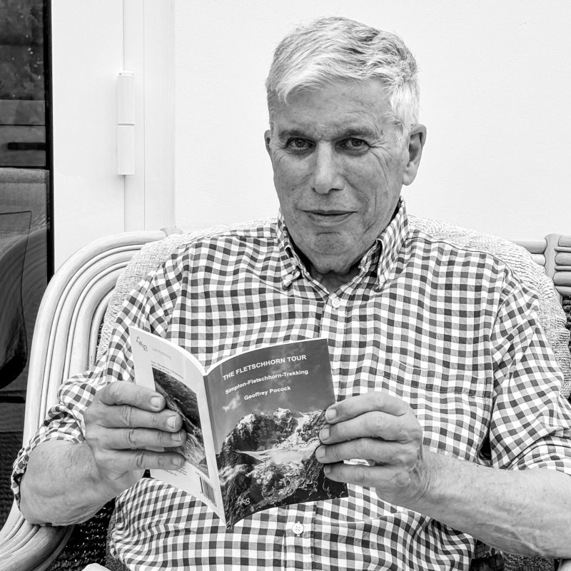 Geoffrey Pocock with their book Pen-Y-Gwryd Hotel