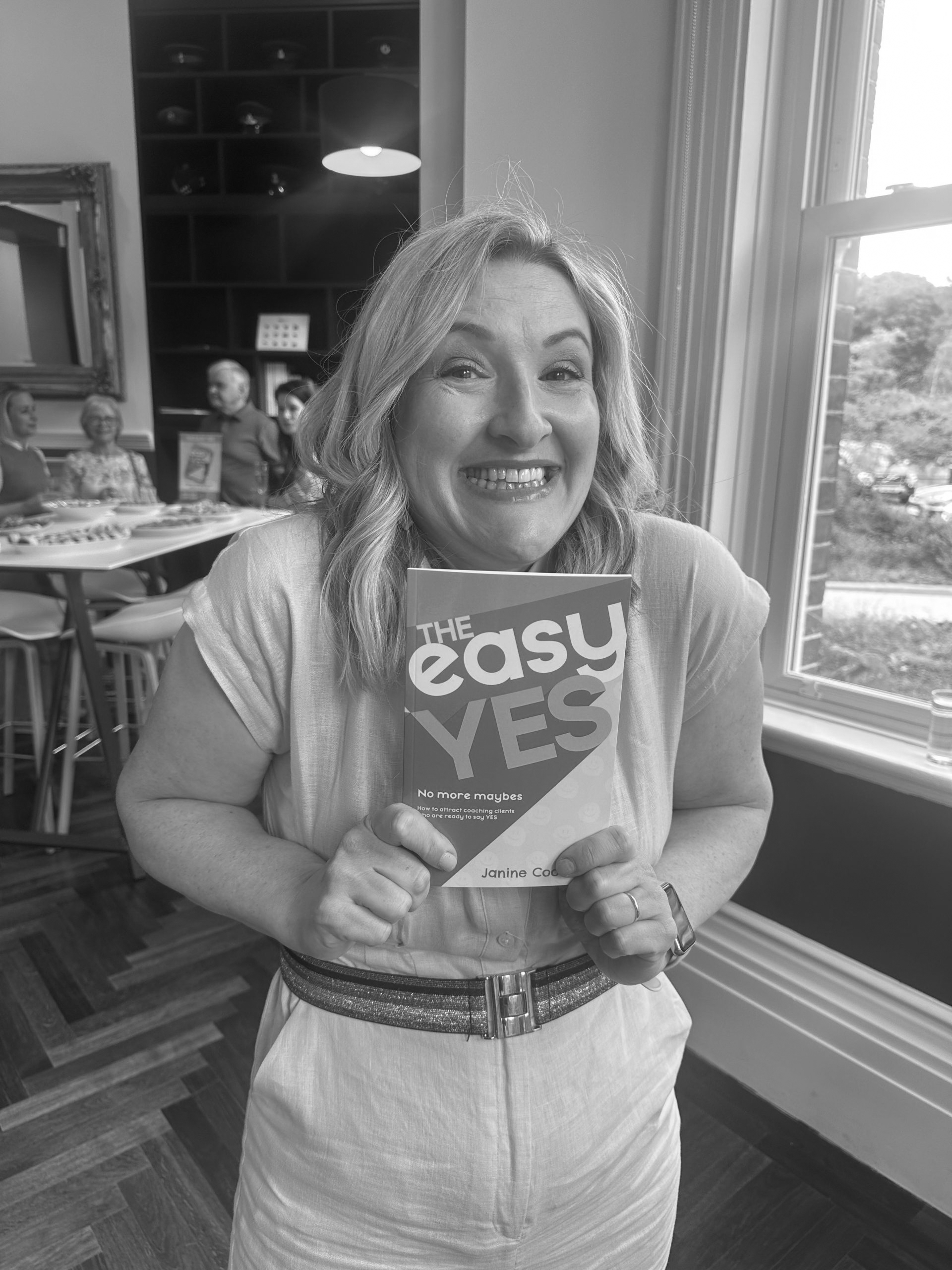 Janine Coombes with her book The Easy Yes