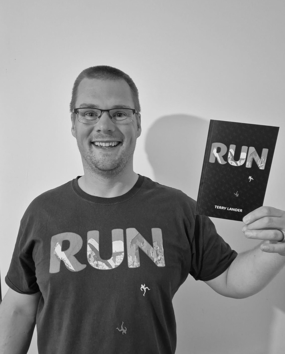 Terry Lander with his book Run