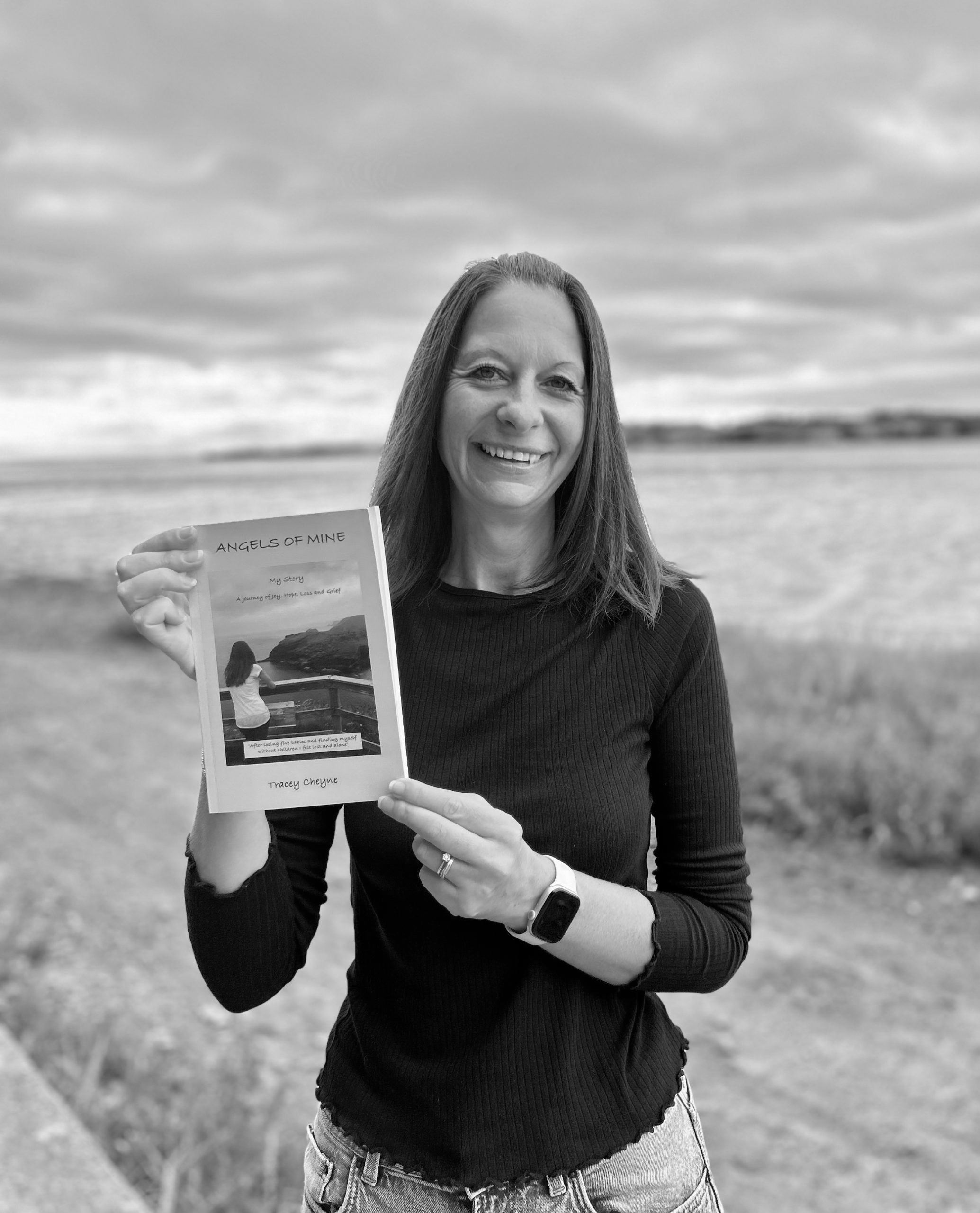 Tracey Cheyne with her book Angels of Mine