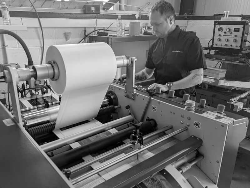 Cover being laminated for a dust jacket