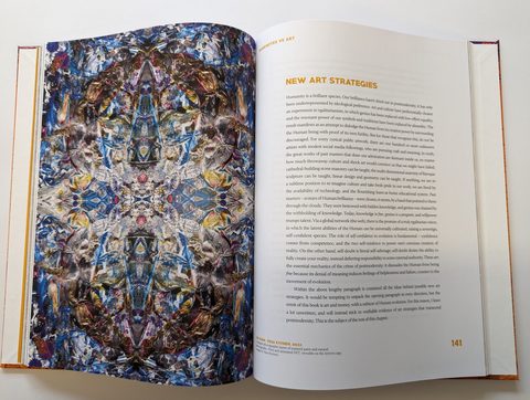 An art book open to a full-page artwork, with coloured page edges