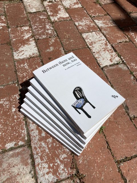 A short run of paperbacks stacked after binding