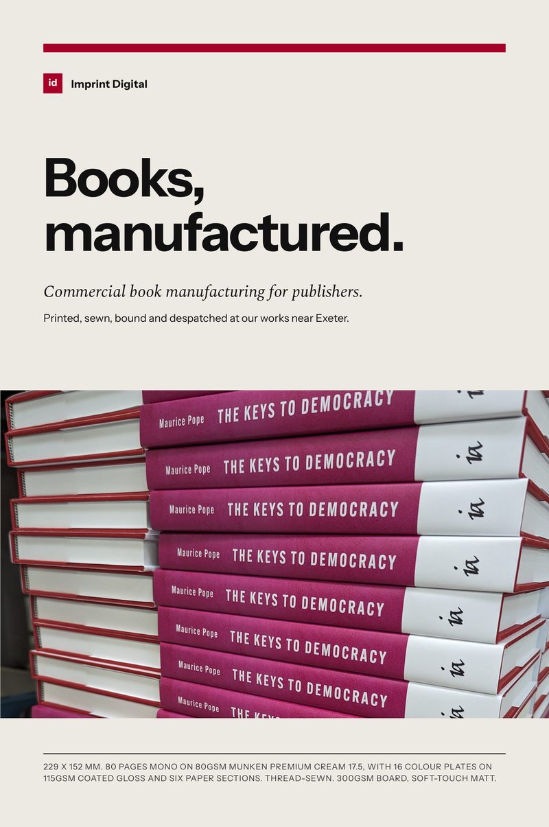 The front cover of our production book, Books, manufactured.: the title in black on a warm white cover, a red rule above, and a photograph of jacketed hardbacks stacked in quantity