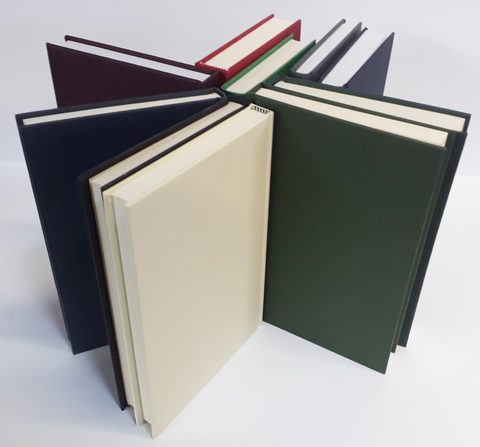 Plain cloth hardbacks in navy, green, burgundy and cream