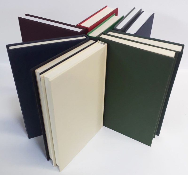 Plain cloth hardbacks in navy, green, burgundy and cream, sewn and cased at our Exeter works