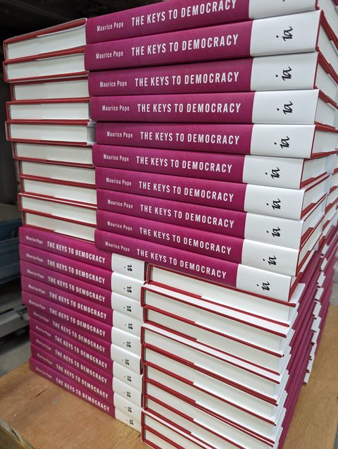 A short run of jacketed hardbacks on the bindery bench