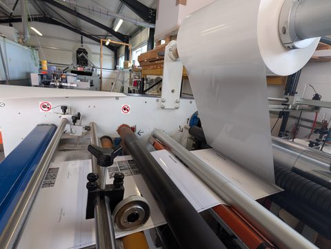 The laminating film roll and rollers, close