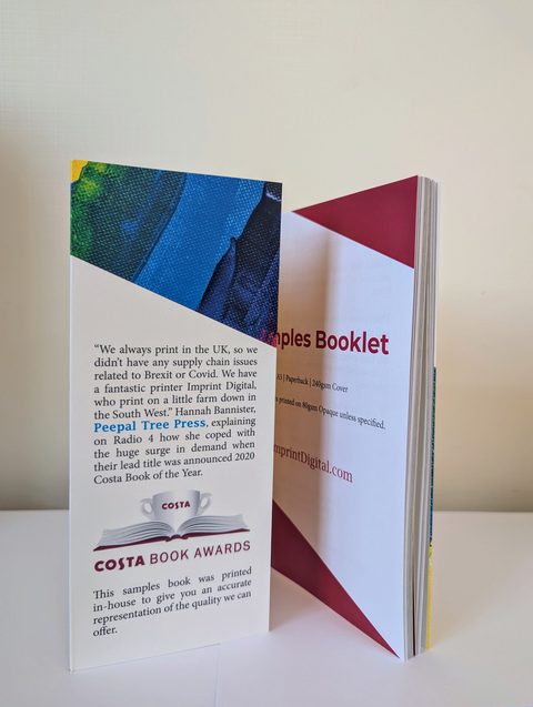A sample booklet standing open