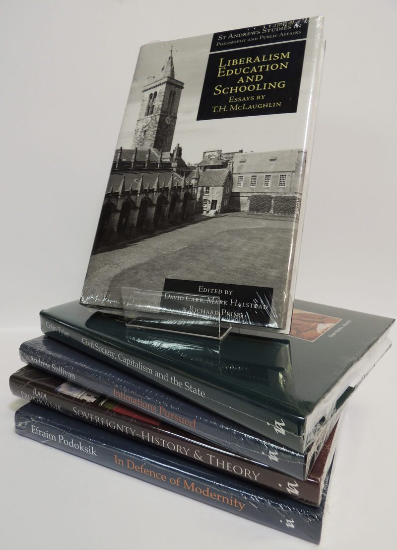Shrink-wrapped hardbacks ready to ship