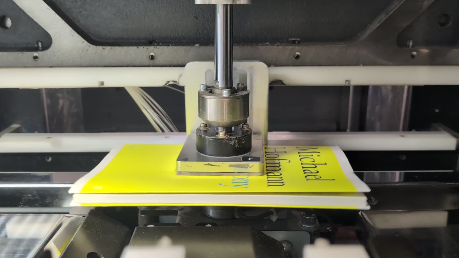 Watch: paperbacks being trimmed at our Exeter bindery